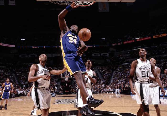 Los Angeles Lakers center Shaquille O'Neal dunks the ball against the San Antonio Spurs.
